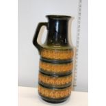 A large West German art pottery handled vase, postage unavailable