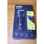 A boxed Braun 3 flex shaver