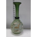A vintage hand painted glass vase