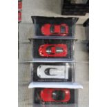 Four boxed die-cast models