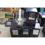 Seven boxed Ascot candle lamps