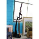 A replica Samurai sword on stand, postage unavailable