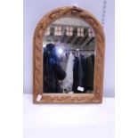 A vintage oak framed mirror, postage unavailable