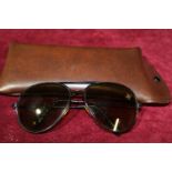 A rare pair of vintage JPS tinted sunglasses with case