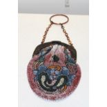 A vintage beadwork ladies bag with faux tortoise shell handle