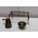 A selection of assorted metal wares including cow bell