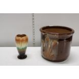 A heavy brown glazed planter and a West German art pottery vase, shipping unavailable