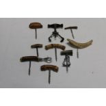 A selection of assorted vintage corkscrews
