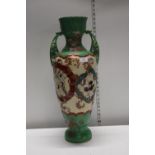 A antique large Green ground handled vase, shipping unavailable