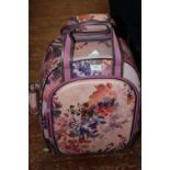 A Roxy travel case. Postage unavailable
