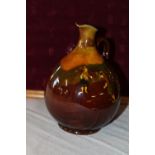 A antique Royal Doulton golfing themed jug