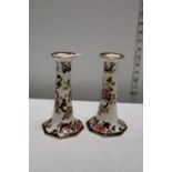 Two Mason's ironstone candlesticks