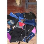 A selection of life preservers and wet suits and a new snorkling mask