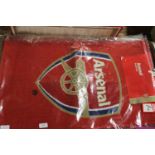 Seven new Arsenal printed rugs/mats