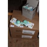 Two boxes of new EOS lip balms