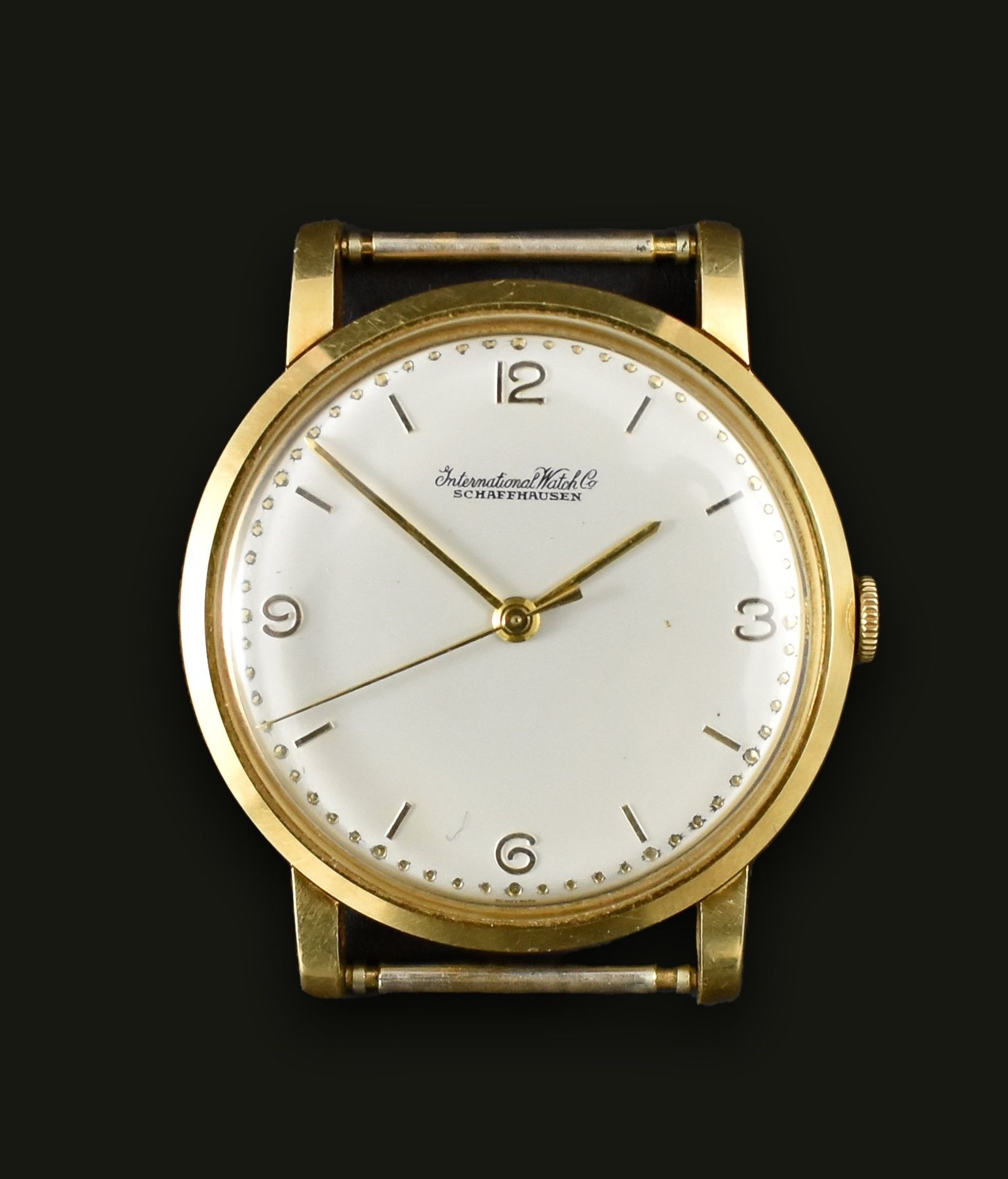 Goldene IWC-Herrenarmbanduhr.