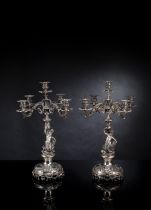 A PAIR OF ITALIAN BAROQUE STYLE FIVE LIGHT SILVER CANDELABRA
