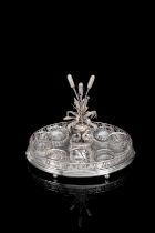 A FINE NEOCLASSICAL SILVER CURET STAND FOR 8 VESSELS
