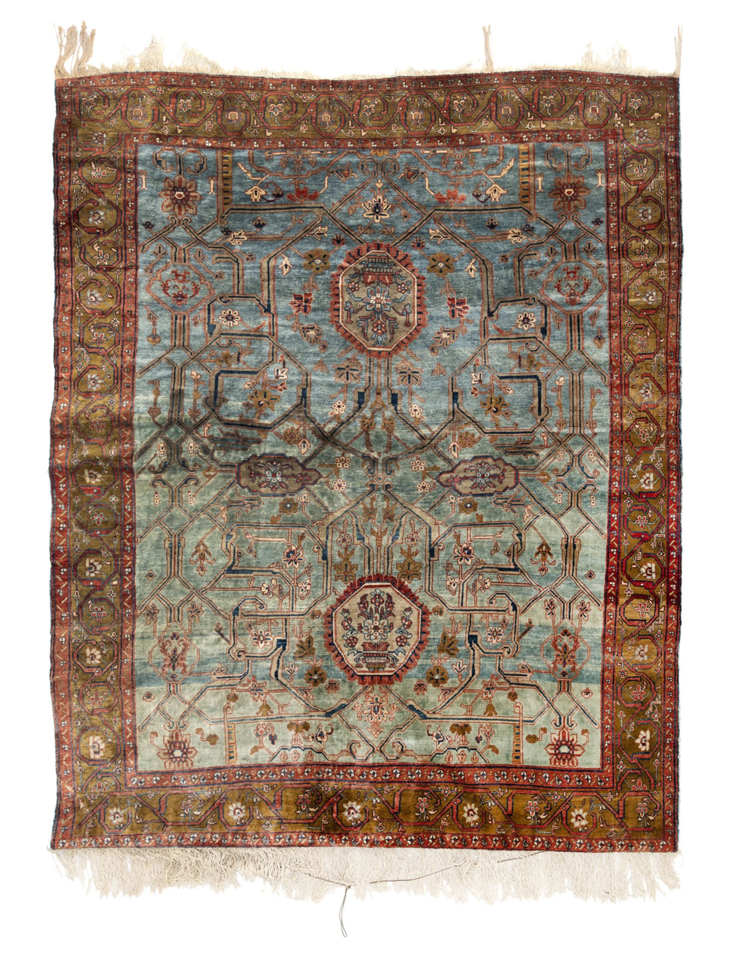 A LIGHT BLUE ANTIQUE HERIZ SILK RUG WITH GARUS POATTERN VARIANT