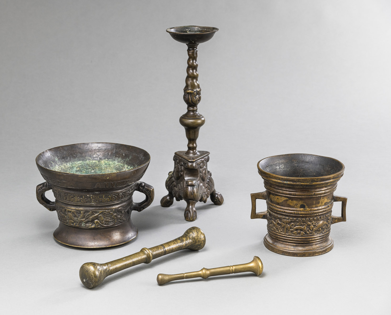 TWO BRONZE MORTARS WITH PESTLES AND A CANDLESTICK - Image 2 of 4