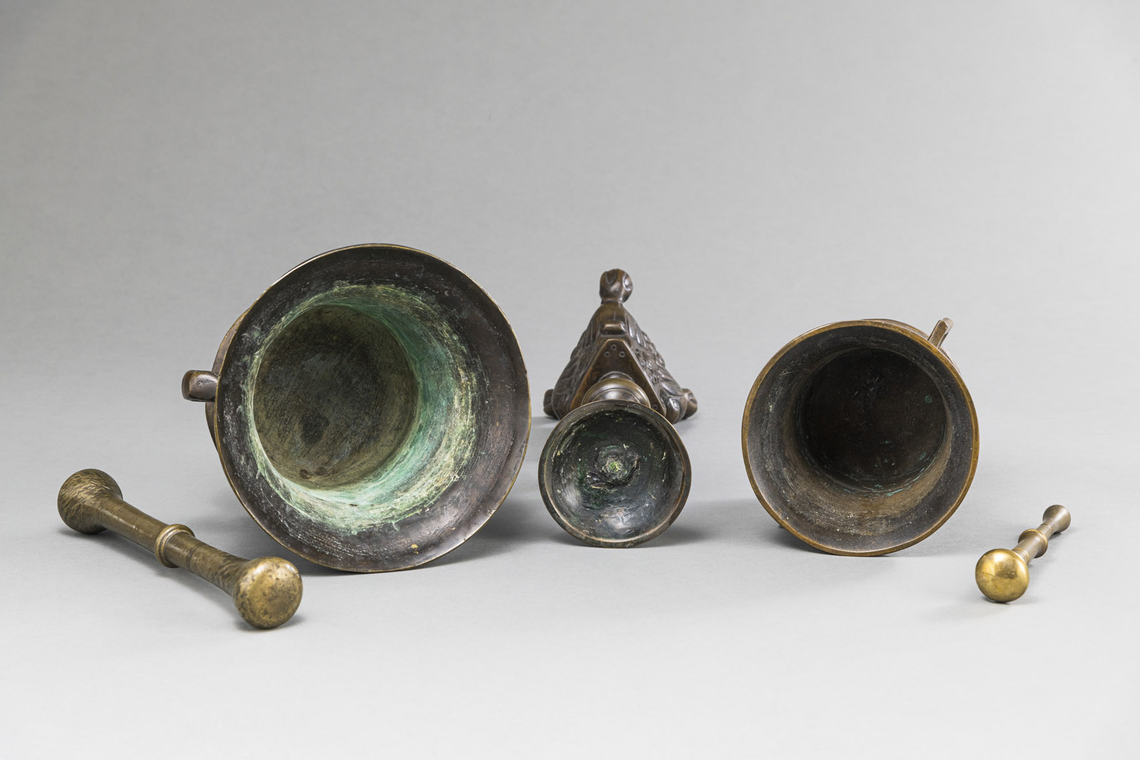 TWO BRONZE MORTARS WITH PESTLES AND A CANDLESTICK - Image 3 of 4