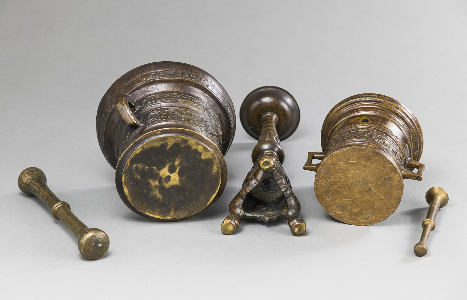 TWO BRONZE MORTARS WITH PESTLES AND A CANDLESTICK - Image 4 of 4