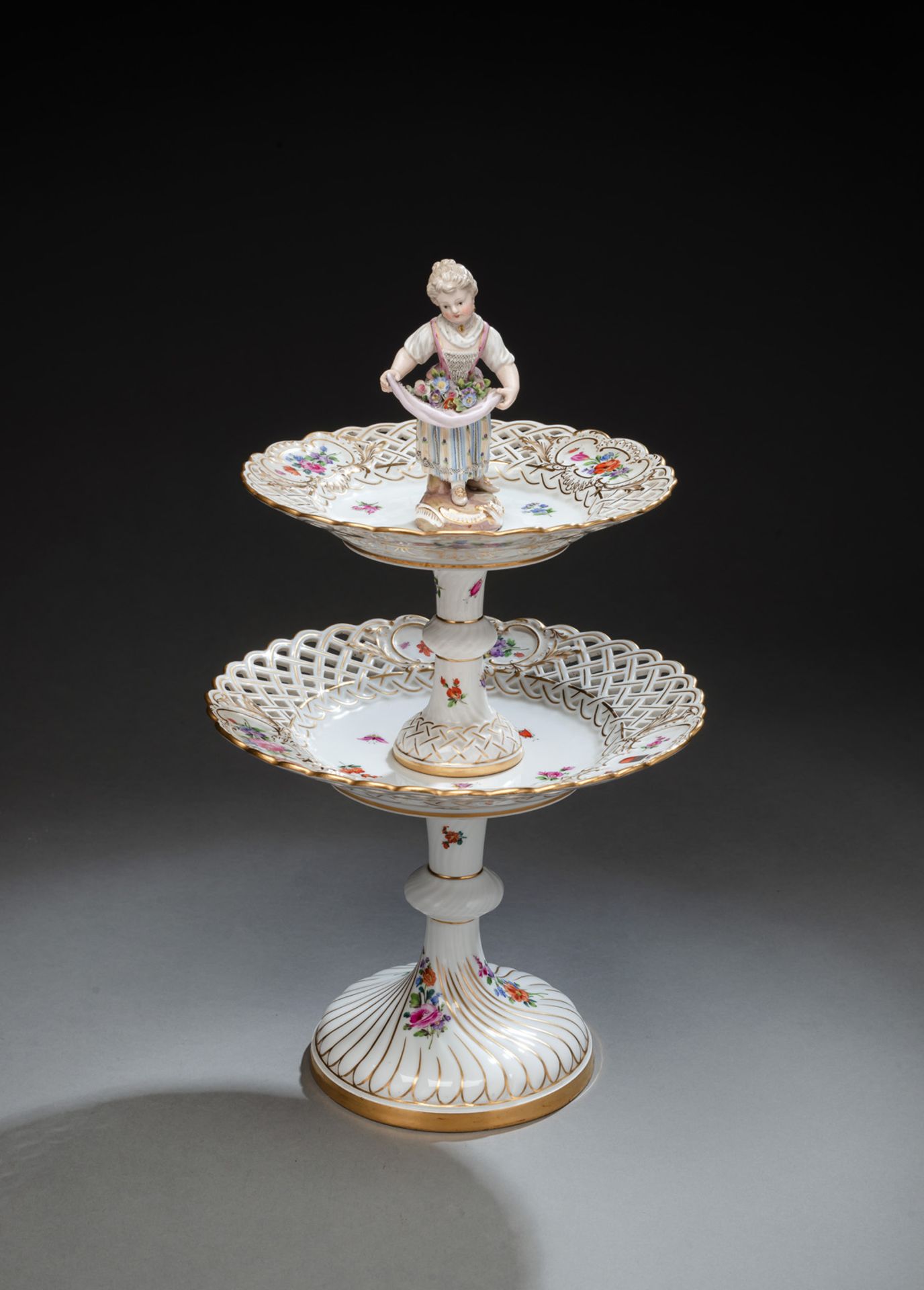 A MEISSEN FLORAL AND INSECT TOOLED CENTRE PIECE WITH A PRINCELY COAT OF ARMS
