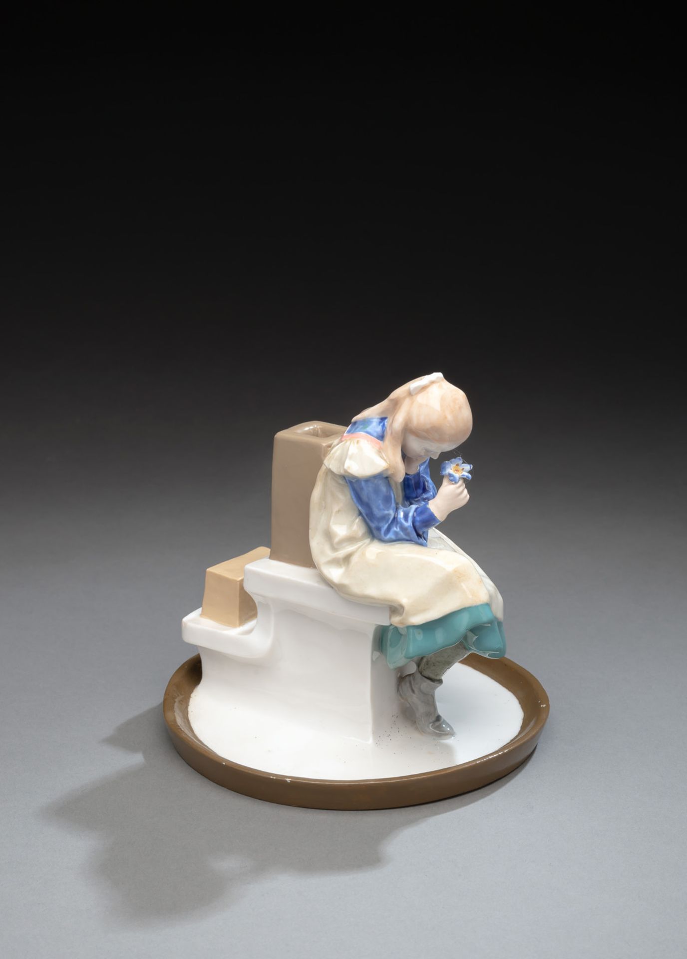 A MEISSEN GIRL WITH A FLOWER (GIRL WITH BOOK)