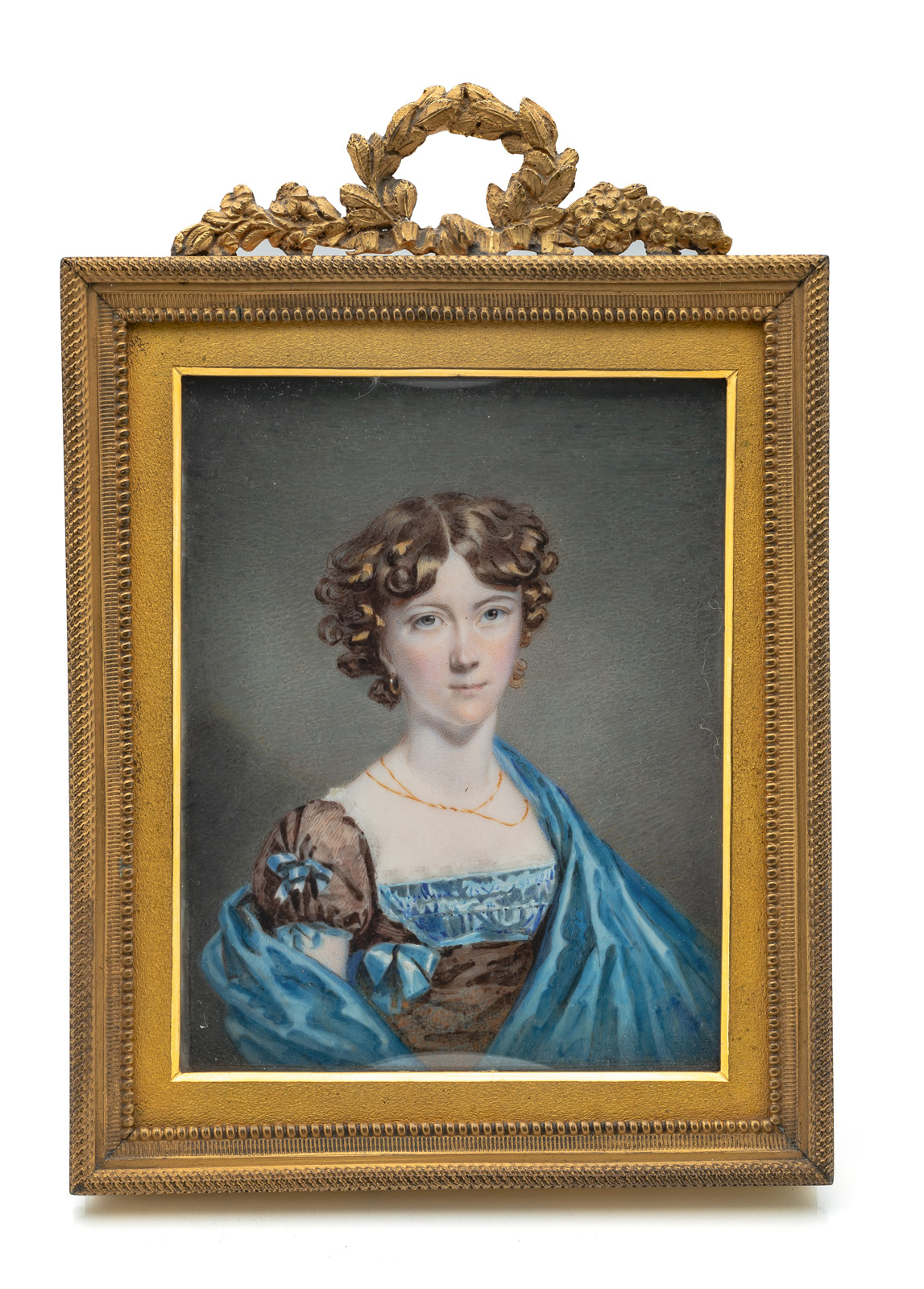 A MINIATURE OF A LADY WITH BLUE SILK SCARF