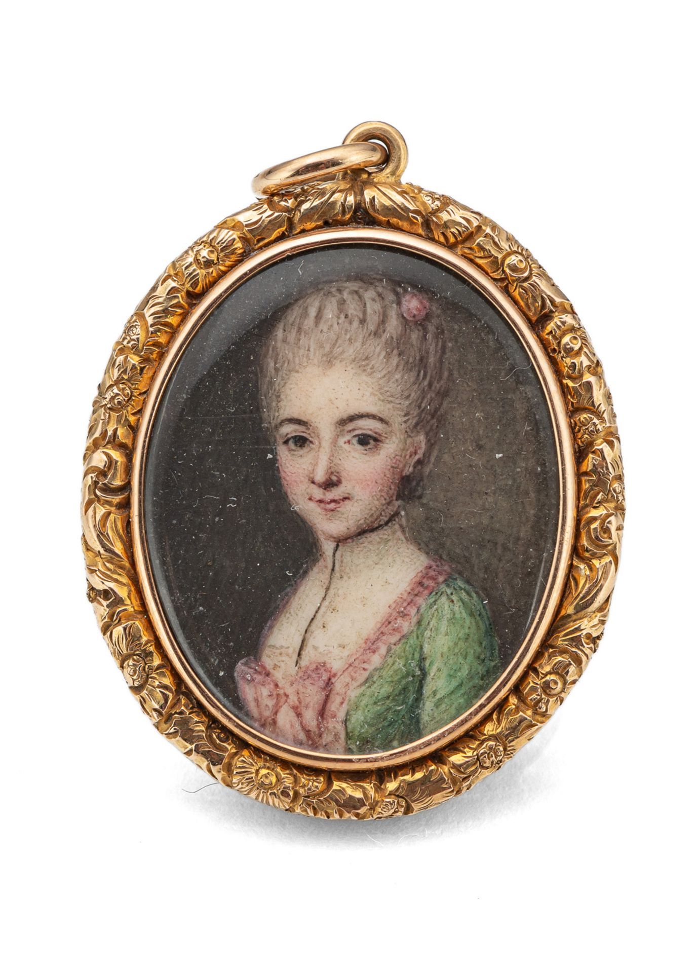 A MINIATUE PORTRAIT OF A YOUNG LADY IN A GREEN DRESS