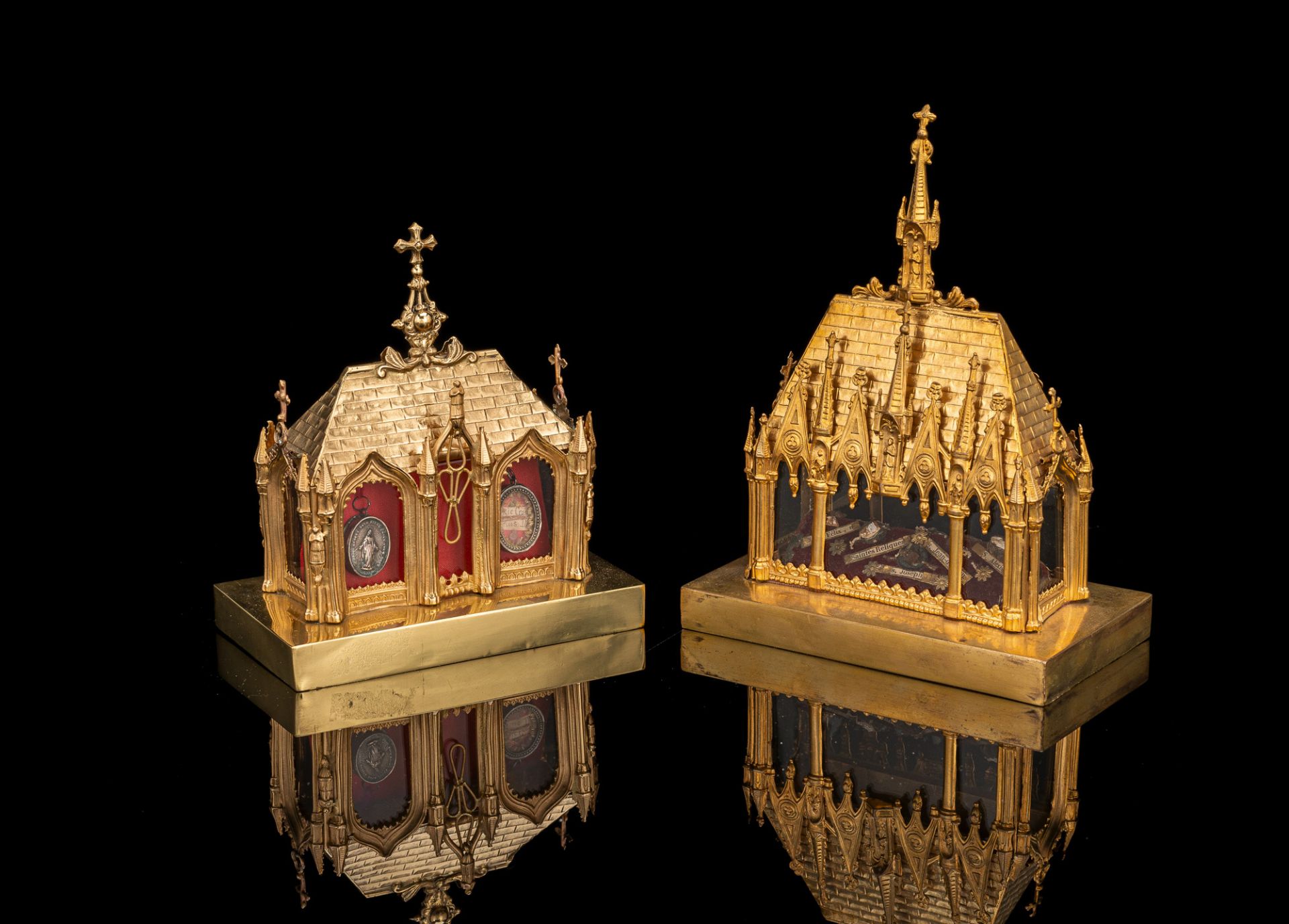 TWO SMALL BRASSGILT RELIQUARY DISPLAY SHRINES