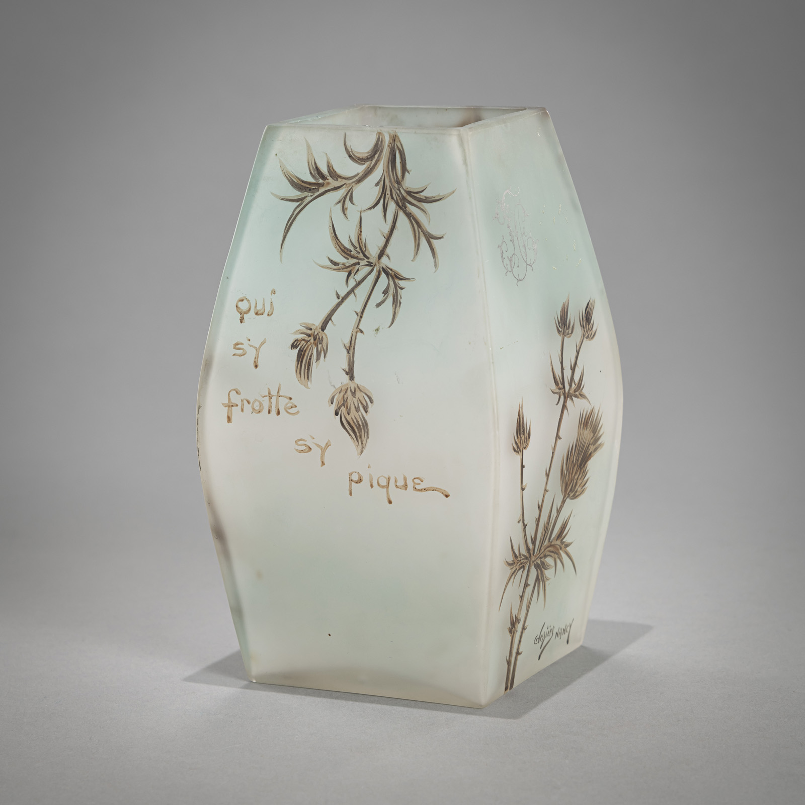 AN ENAMEL PAINTED THISTLE PATTERN GLASS VASE