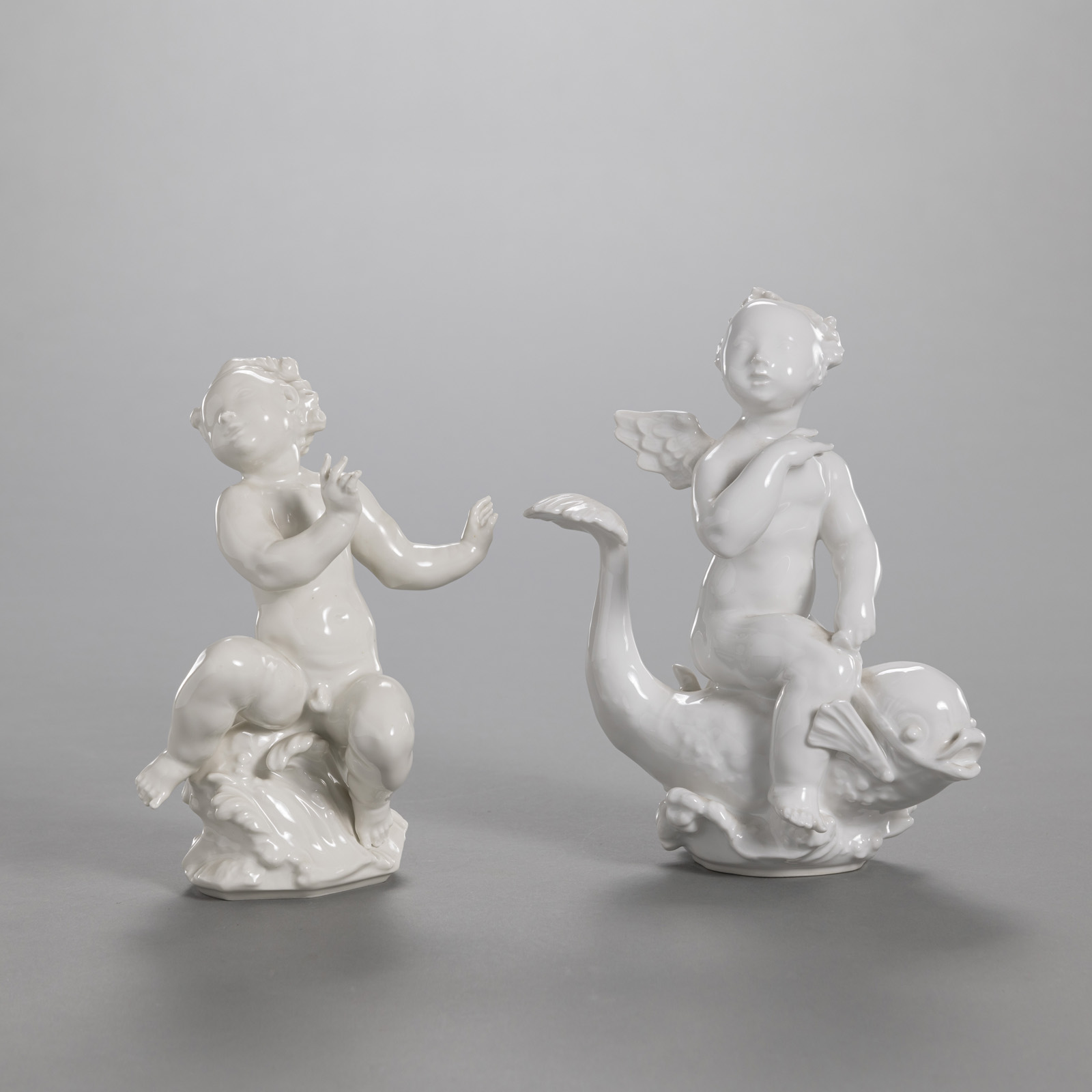 TWO PUTTI FROM THE CENTRE PIECE "THE BIRTH OF BEAUTY"