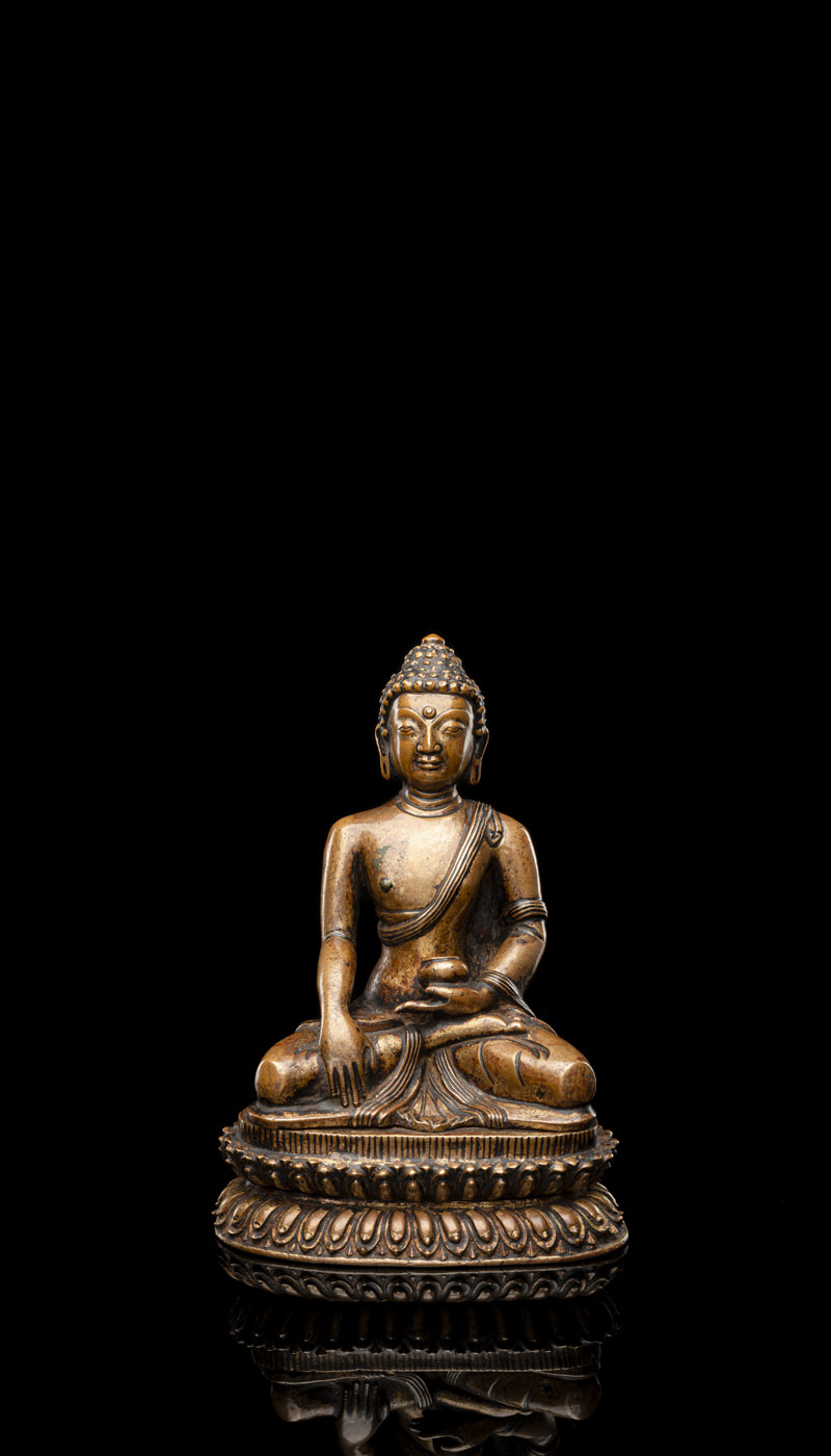 A COPPER FIGURE OF BUDDHA SHAKYAMUNI