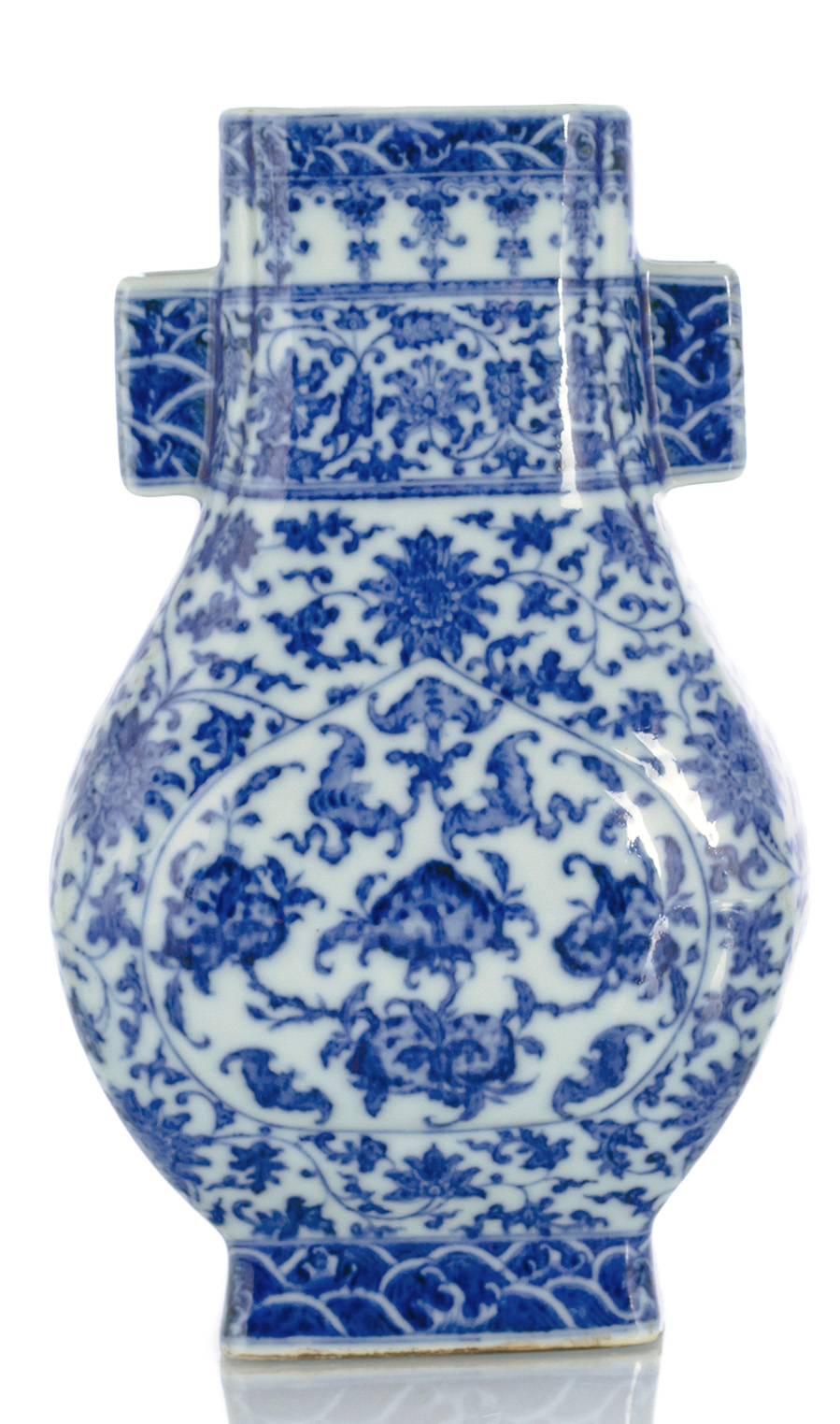 A FANG HU-SHAPED BLUE AND WHITE LOTUS AND PEACHES VASE