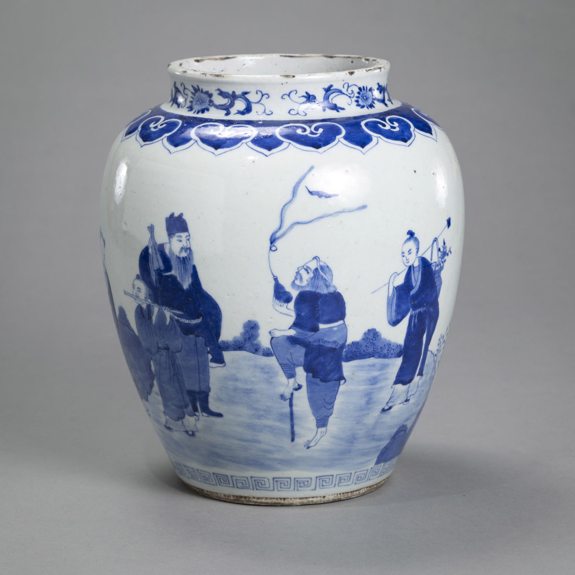 A PORCELAIN JAR WITH UNDERGLAZE BLUE DECORATION OF THE EIGHT IMMORTALS