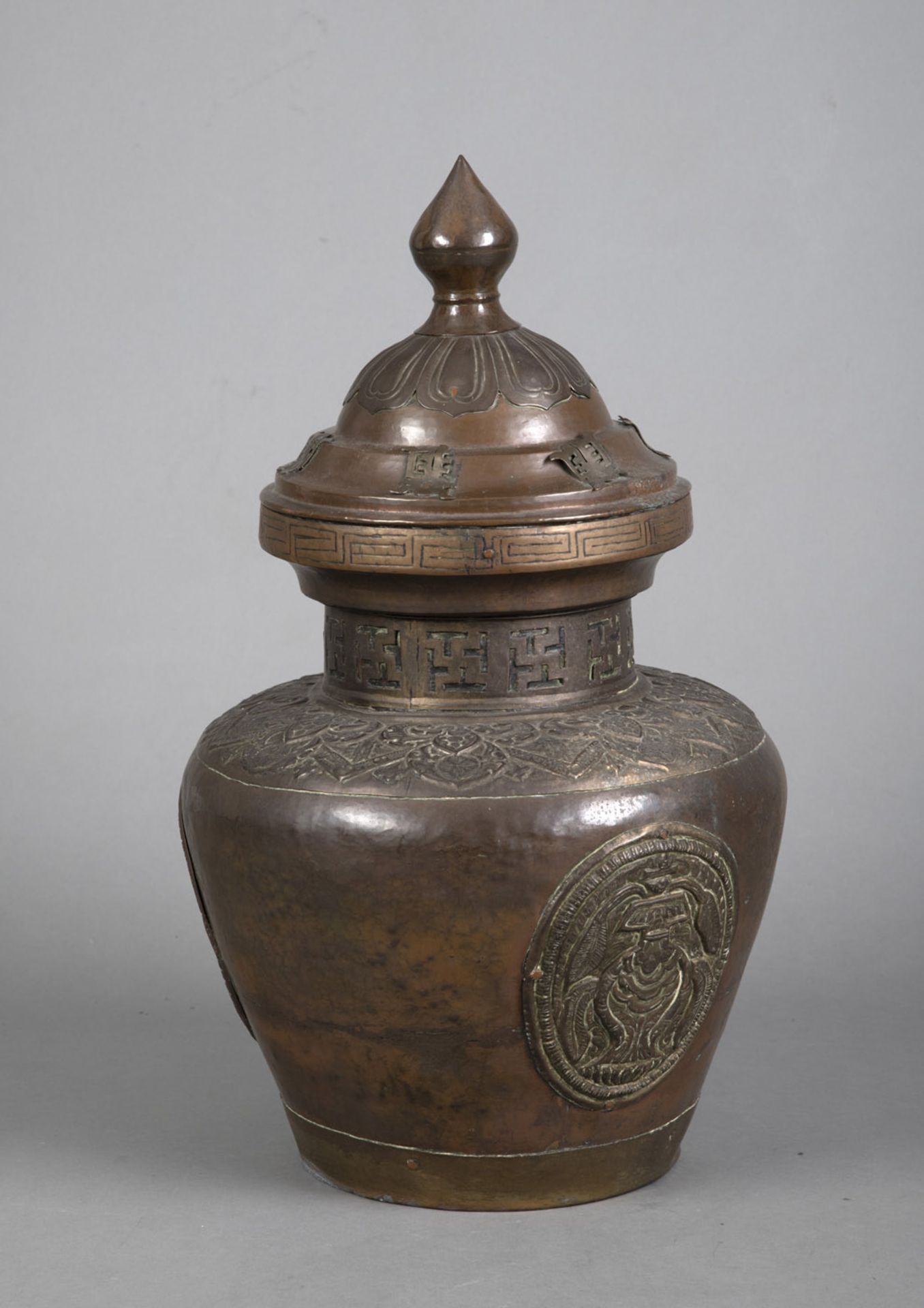 A LARGE EMBOSSED COPPER AND BRASS STORAGE VESSEL WITH SURROUNDING SWASTIKA AND "SHOU" CHARACTER DEC - Image 2 of 4