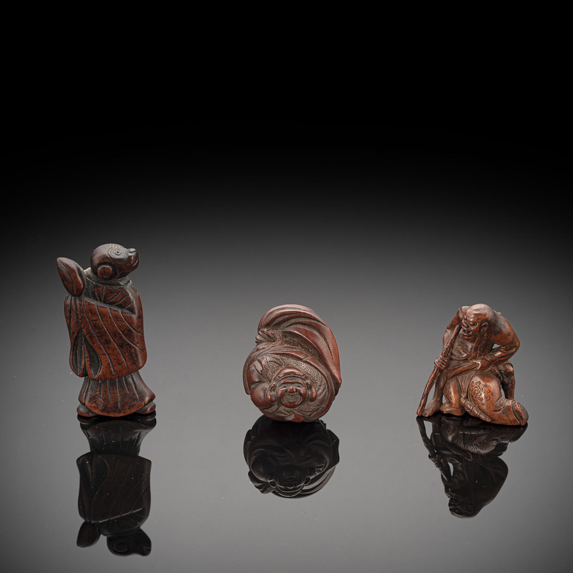 Drei Netsuke aus Holz