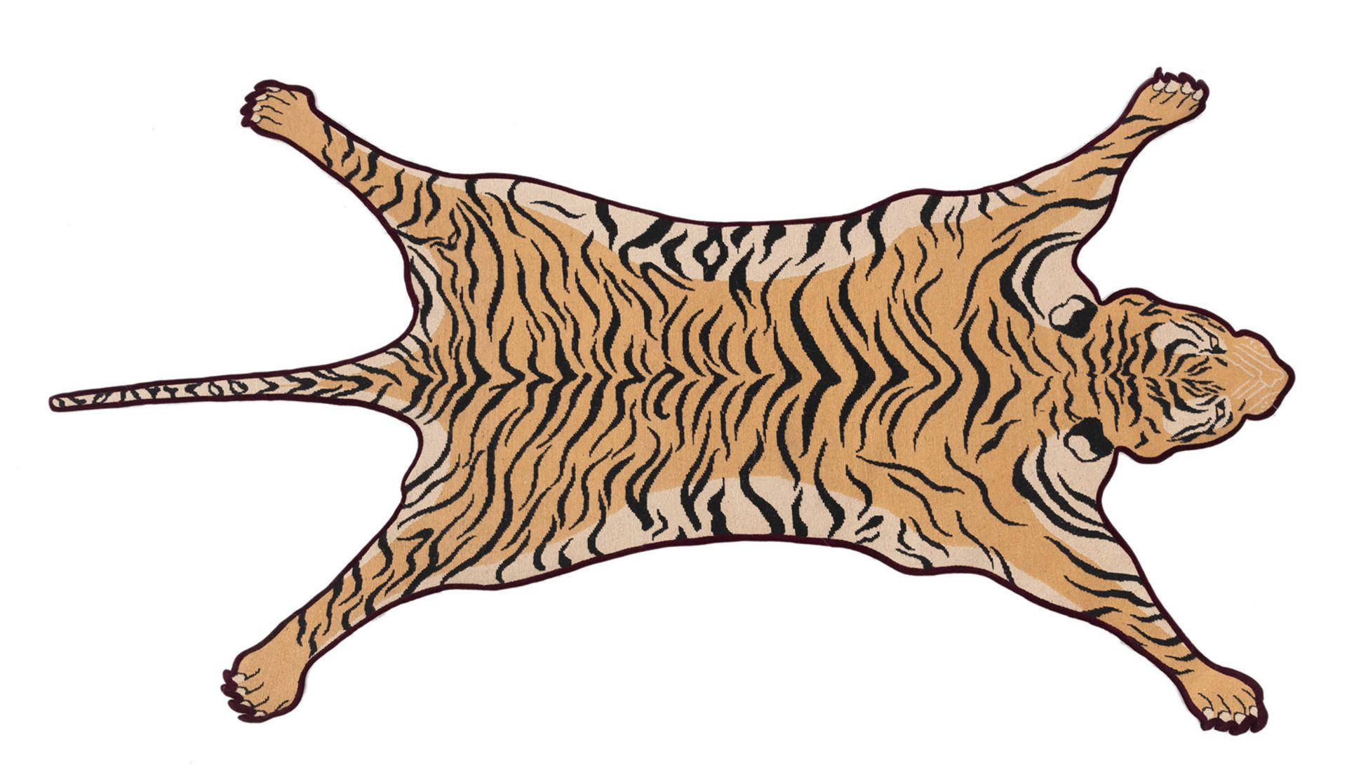 A WOOL RUG KNOTTED IN THE SHAPE OF A TIGER PELT