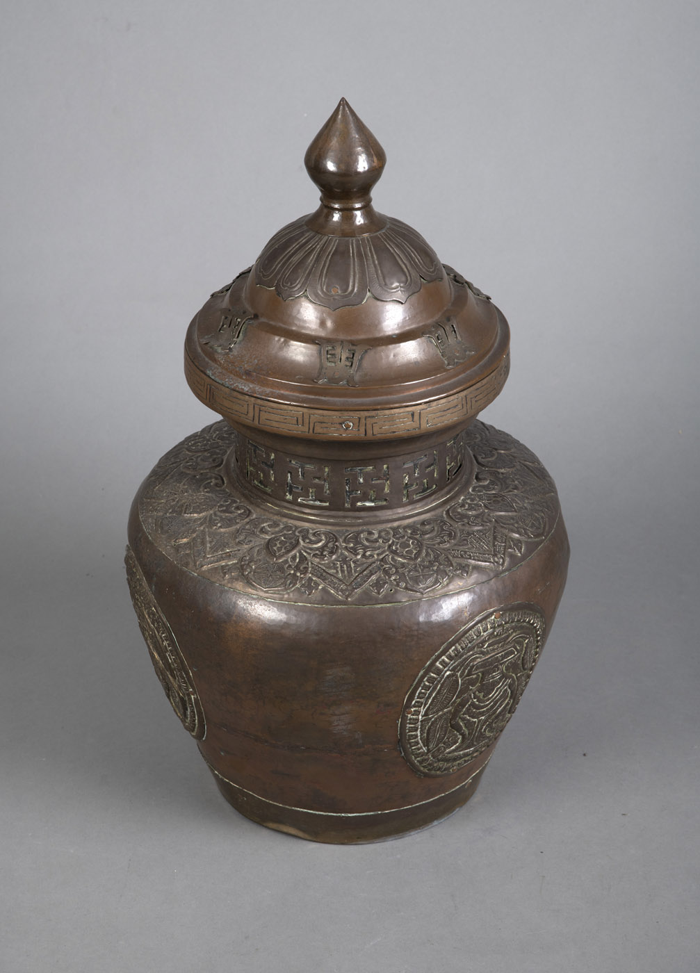 A LARGE EMBOSSED COPPER AND BRASS STORAGE VESSEL WITH SURROUNDING SWASTIKA AND "SHOU" CHARACTER DEC - Image 3 of 4