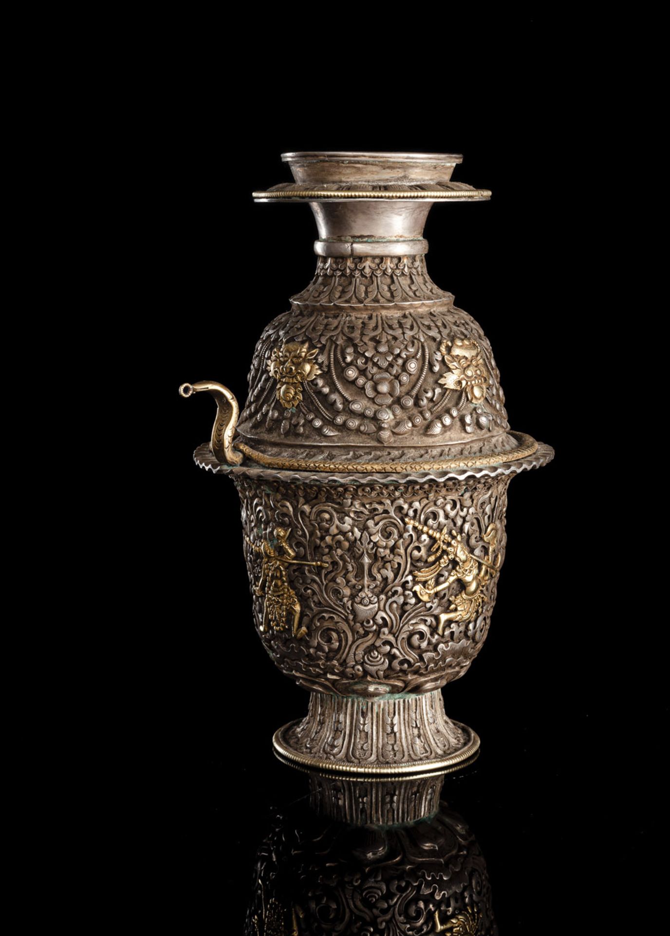 AN EMBOSSED PARCEL-GILT SILVER RELIC CONTAINER - Image 2 of 2