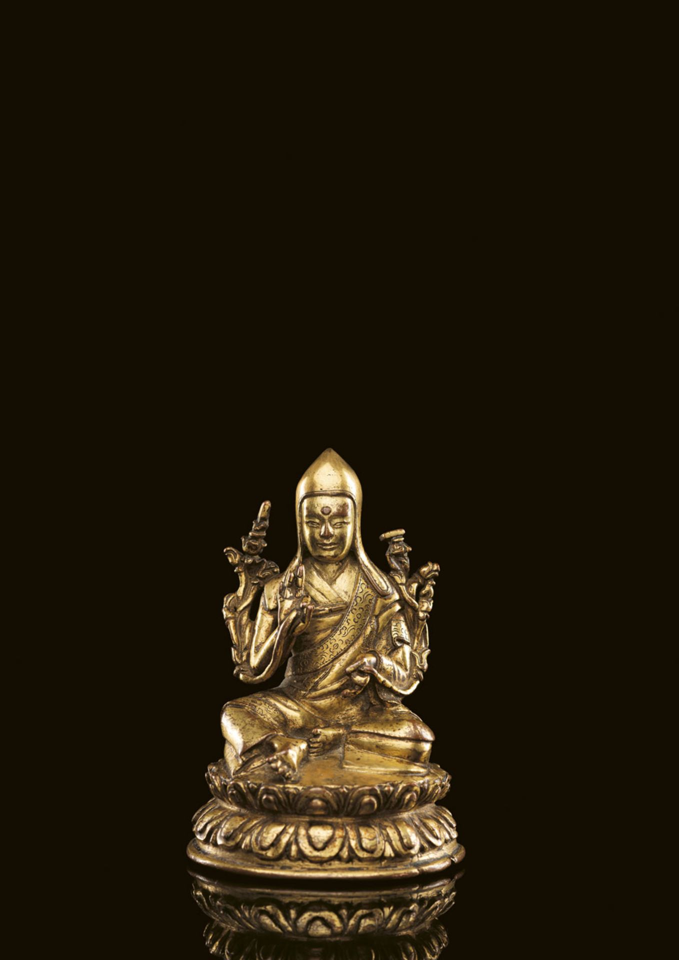 A GILT COPPER ALLOY FIGURE OF THE SIXTH SAKYA TRIDZIN, SAKYA PANDITA KUNGA GYALTSEN