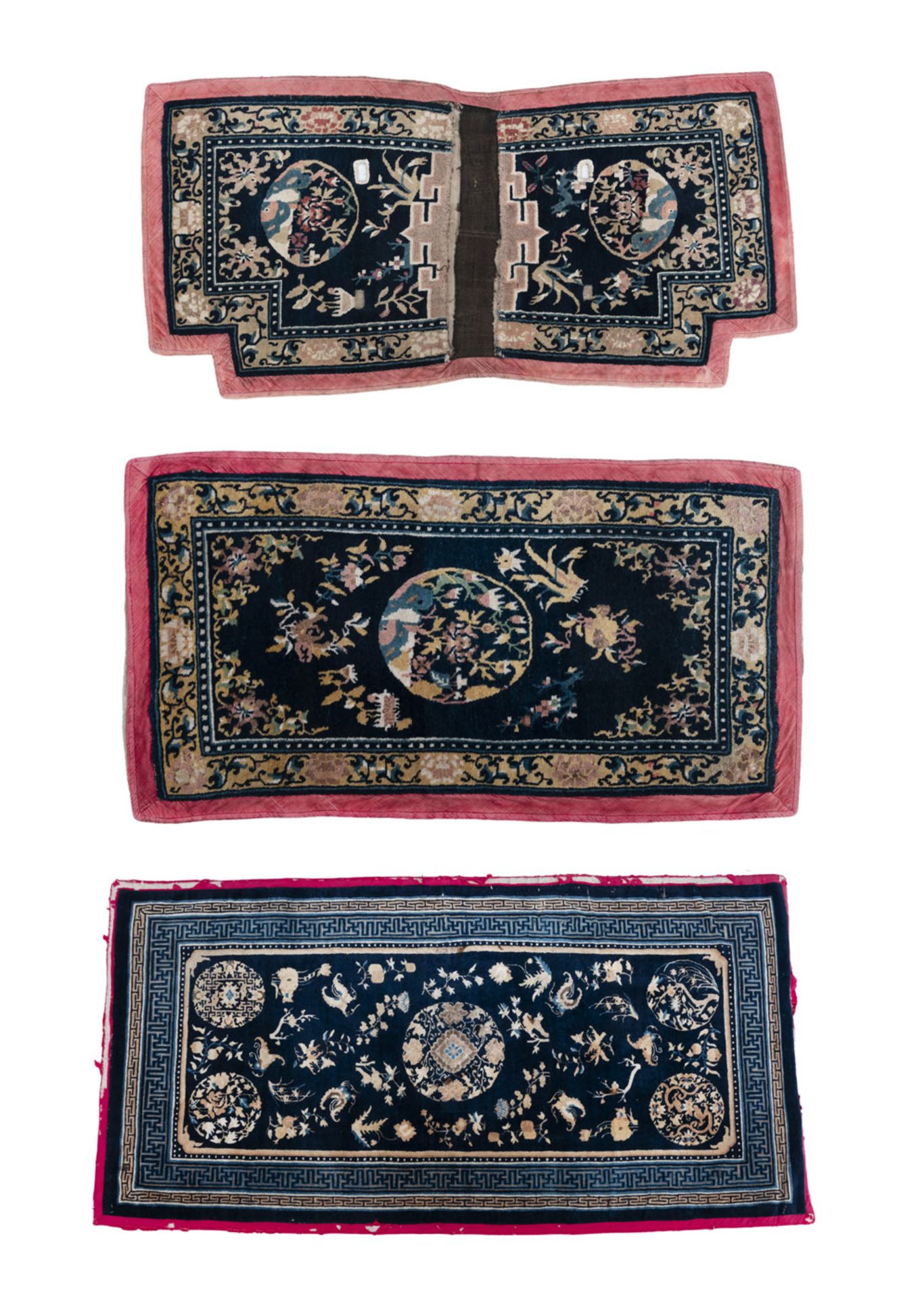 TWO CHINESE CARPETS FOR THE TIBETAN MARKET AND A TIBETAN SADDLE COVER