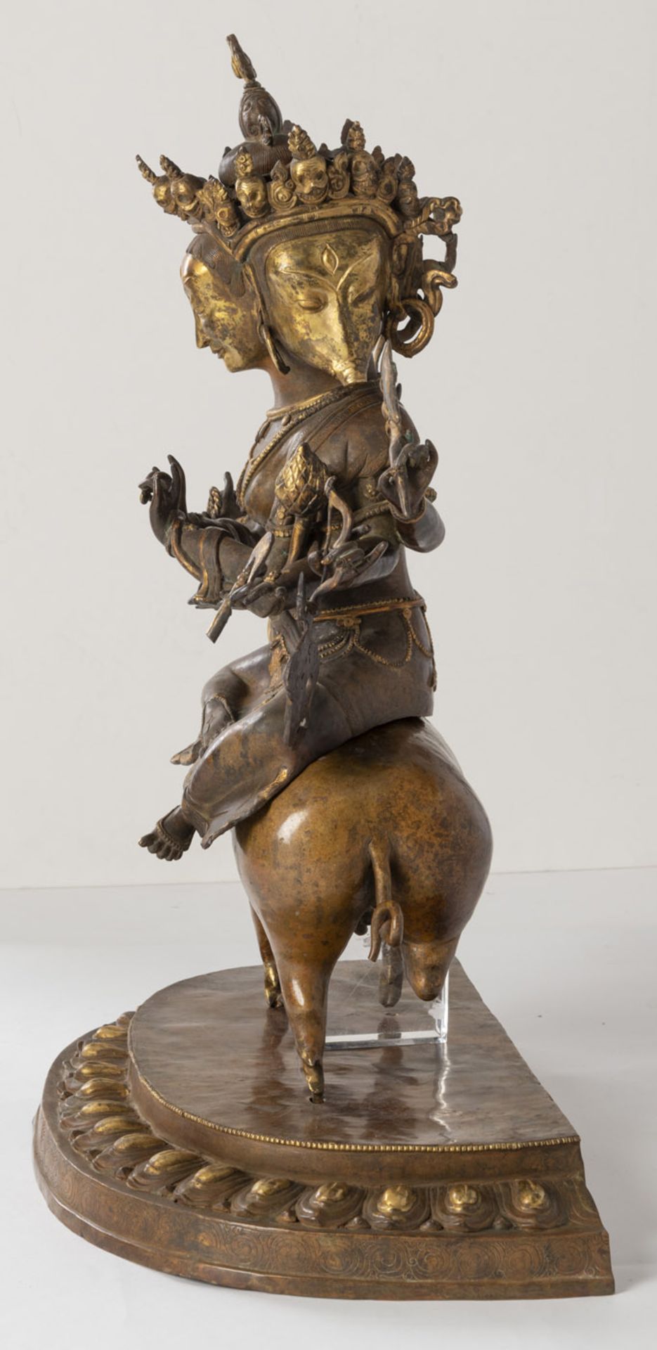 A LARGE BRONZE FIGURE OF A BUDDHIST DEITY SEATED ON A PIG - Image 2 of 4