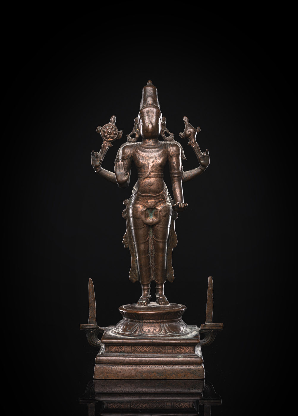 A BRONZE FIGURE OF VISHNU