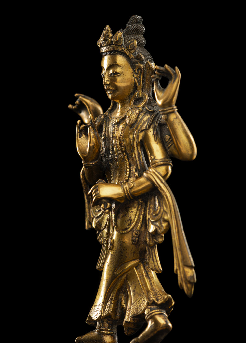 A RARE GILT-BRONZE OF A FOUR-ARMED FIGURE OF AN OFFERING GODDESS - Image 2 of 2