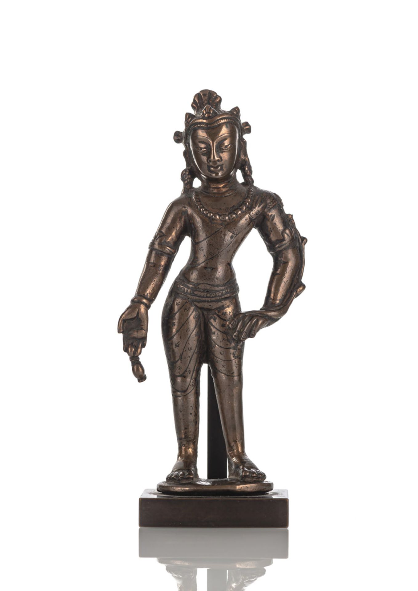 A BRONZE FIGURE OF MAITREYA WITH TRACES OF SILVER INLAYS