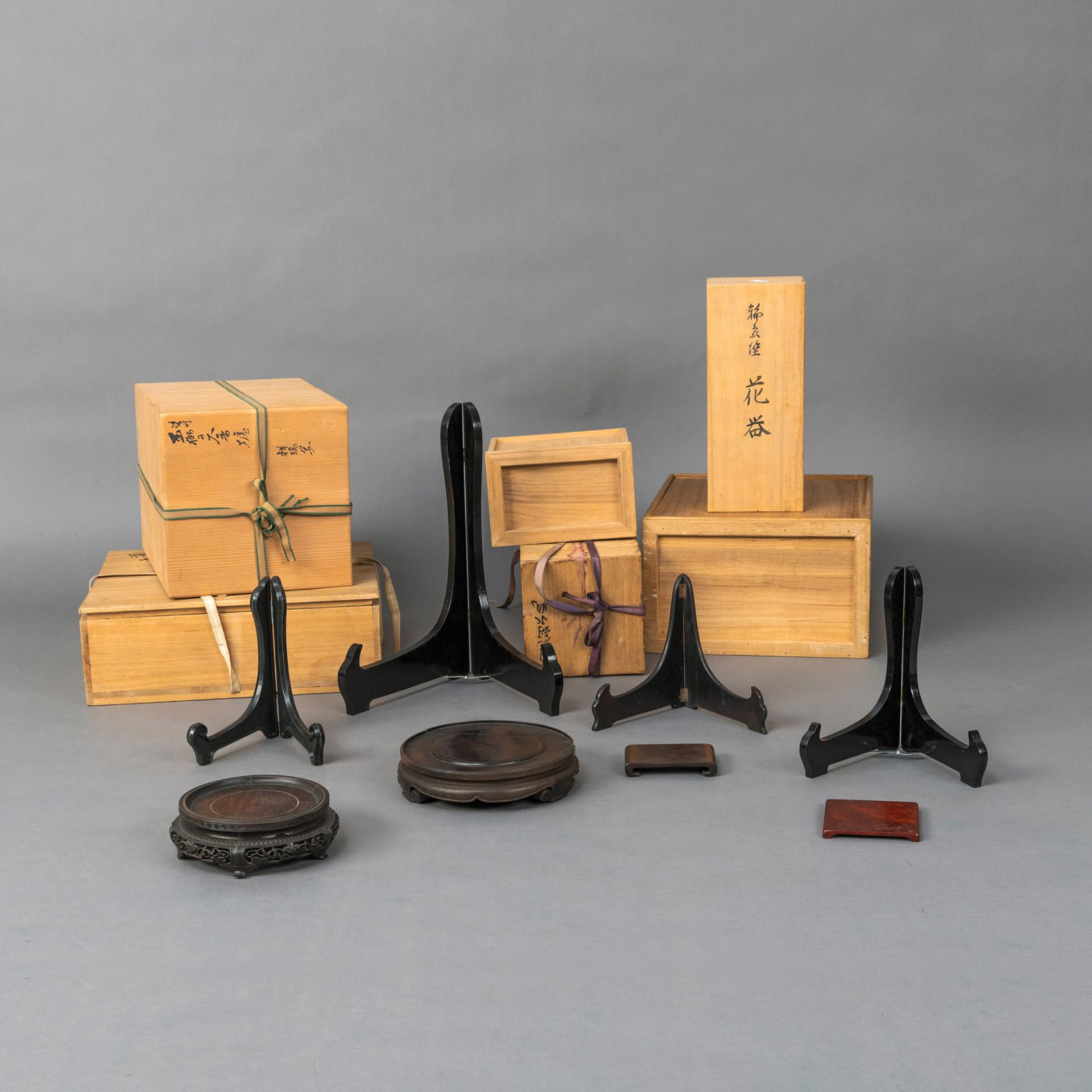 SIX WOODEN BOXES AND SEVEN STANDS