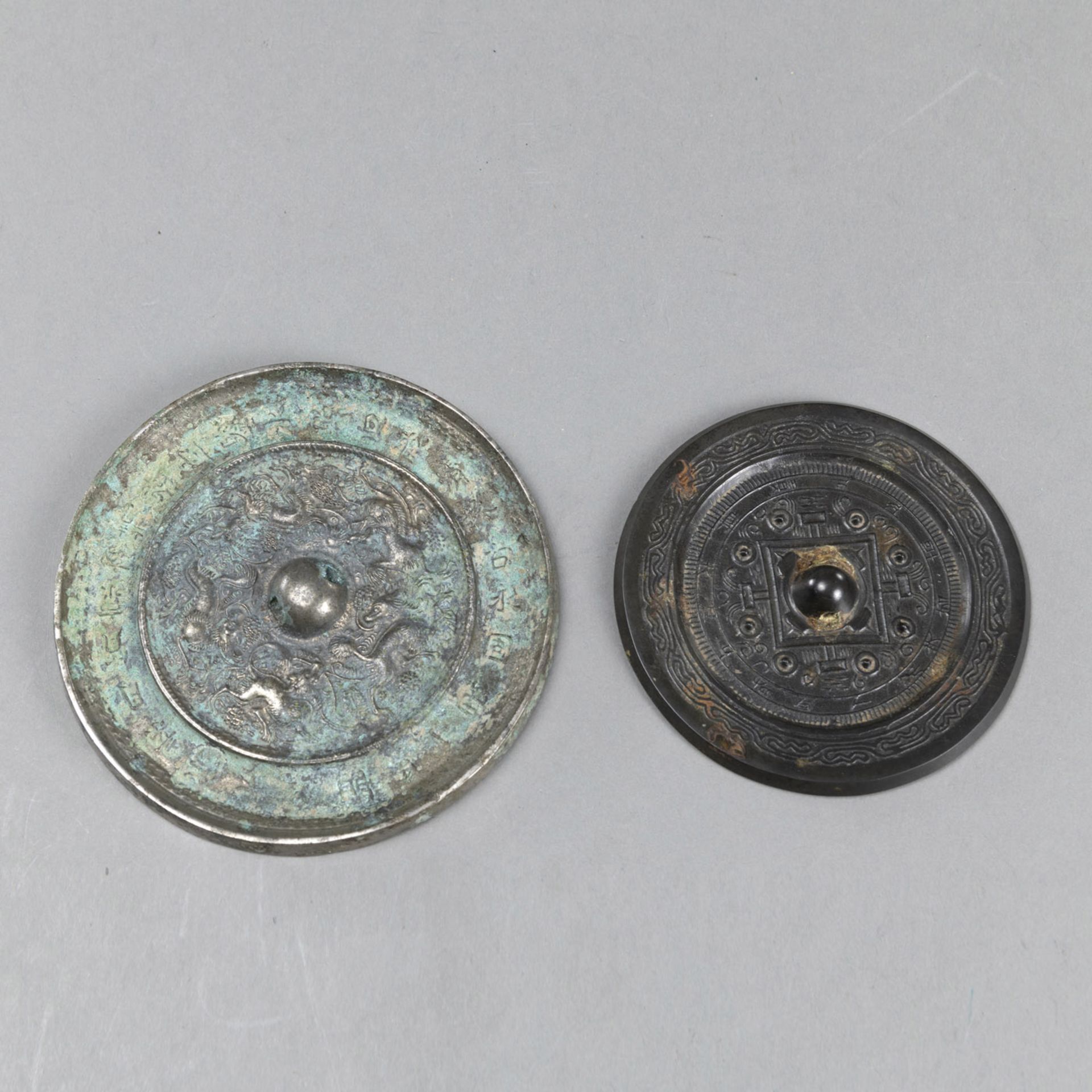 TWO BRONZE MIRROS WITH INSCRIPTIONS