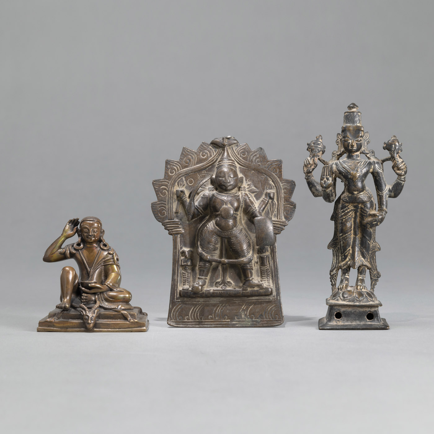 A GROUP OF BRONZES, INCLUDING A FIGURE OF MILAREPA